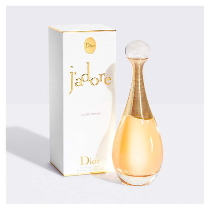 Dior j'adore perfume bottle and packaging on a white background