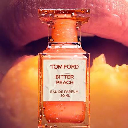 Tom Ford Bitter Peach perfume bottle with a blurred background